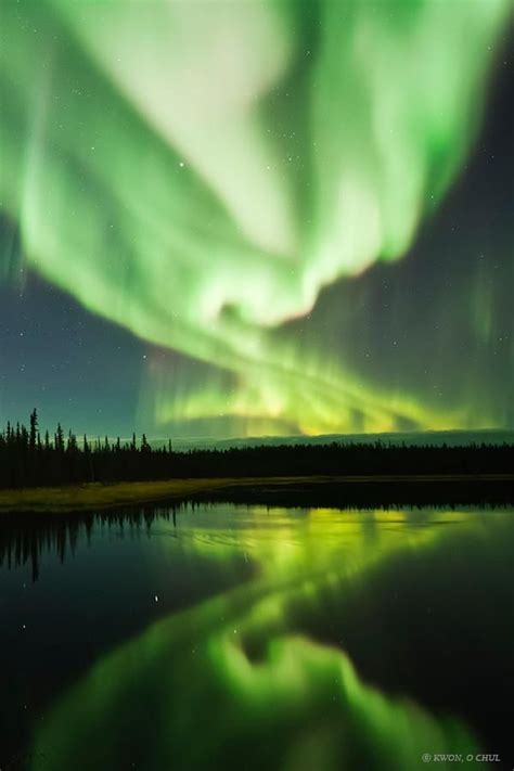 Dazzling Displays Of Aurora Borealis Dance Across The Night Sky