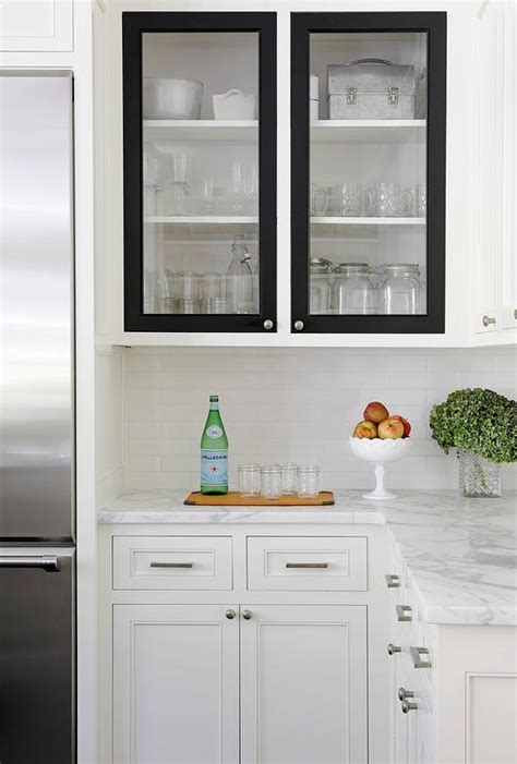 White cabinets brighten your kitchen and bring clean quality to any style. White Kitchen Cabinets with Black Doors - Transitional ...