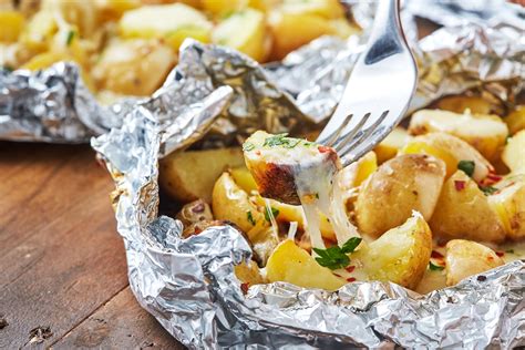 Campfire Potatoes Are The Cheesy Side We Crave On Camping Trips