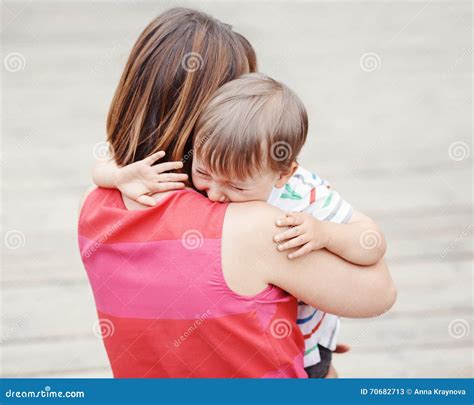 Woman Mother Comforting Her Crying Little Toddler Boy Son Stock Image
