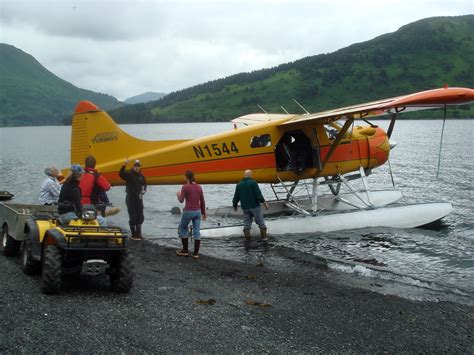 Floatplane Dropping Off Guests In The Wilderness Near Kodiak Alaska