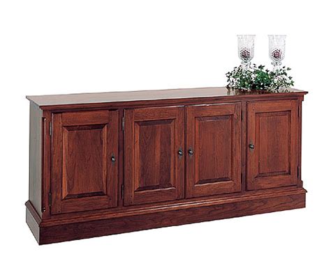 Three utility drawers two wood framed cabinet. Cherry Buffet / Credenza