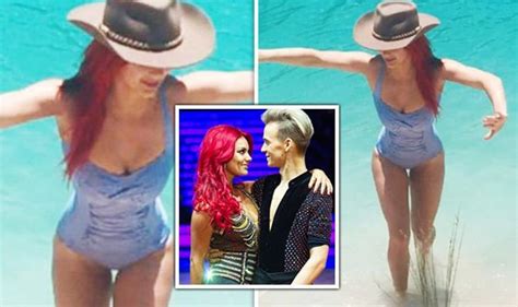 Dianne Buswell Flaunts Cleavage In Low Cut Swimsuit After Joe Sugg