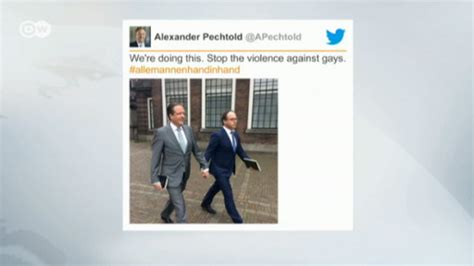 Dwnews Dutch Men Hold Hands In Solidarity With Attacked Gay Couple