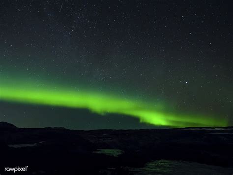 Hills Covered With Snow And Northern Lights Free Image By