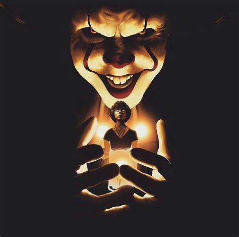 A Creepy Clown With His Hands In Front Of Him And The Light Coming From It