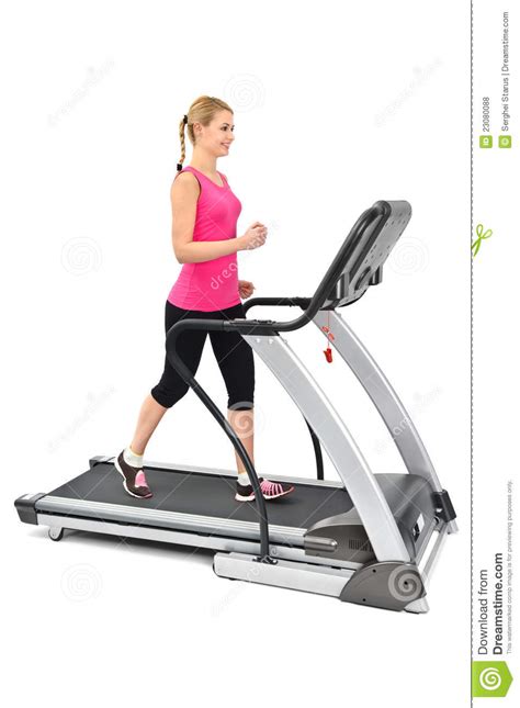 Young Woman Doing Exercises On Treadmill Royalty Free