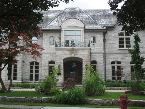 Others can be purchased in raw lumps for processing into your preferred shapes. Indiana Limestone house in Toronto | CWB MTL | Flickr