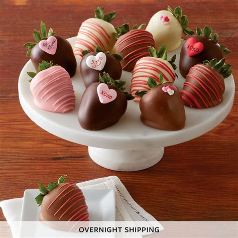 154028989 Valentines Day Hand Dipped Chocolate Covered Strawberries On