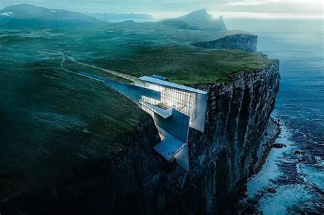 Daring Cliffside Retreat Carved Into Icelandic Rock Merges With The Craggy Landscape