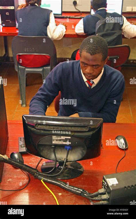 School Boy Working On Computers In Computer Classroom St Marks School