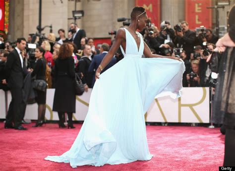 Lupita Nyongo Wows In Light Blue Prada Gown At The Oscars And Takes