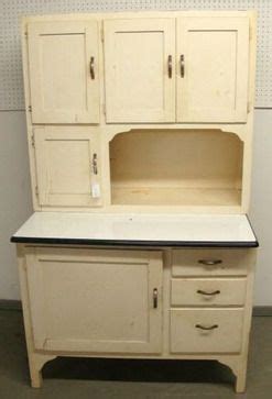 Traditional beautiful wood kitchen cabinets in antique white! Antique Hoosier Cabinet just like mine but mine has ...