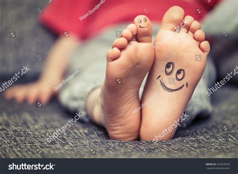 Concept Kids Feet Smiley Face Drawing Stock Photo Edit Now 423558478