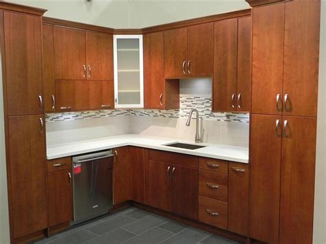 Cherry's grain is more subdued than some other hardwood species and possesses a very interesting character. Decorating With Cherry Wood Kitchen Cabinets - My Kitchen ...