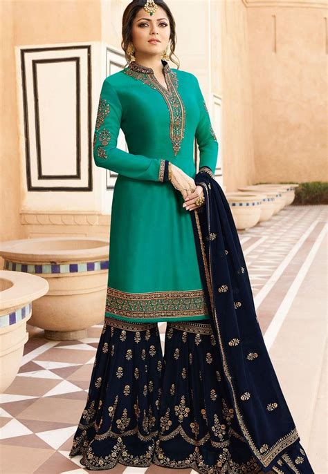 Drashti Dhami Sky Blue Satin Georgette Embroidered Sharara Style Suit
