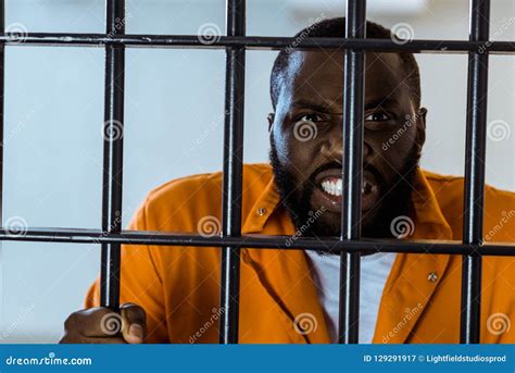 Angry African American Prisoner Holding Stock Image Image Of Alone