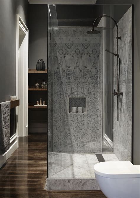 These designer bathrooms use tile on floors, walls, and backsplashes to stylish effect. Stylish Shower Wall Tile Ideas For The Modern Home