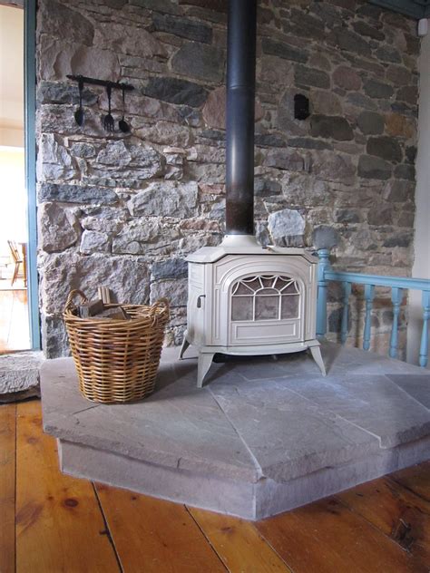 Woodstove And Stone Love This Stone Wood Stove Wall Corner Wood