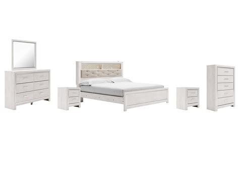 Altyra King Panel Bookcase Bed With Mirrored Dresser Chest And 2