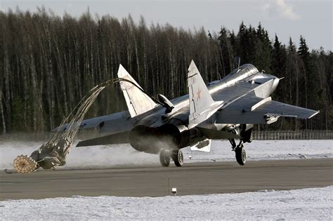 The aircraft was designed by the mikoyan design bureau as a replacement for the earlier. Mikoyan-Gurevich Mig-31 Foxhound While Releasing Parachute ...