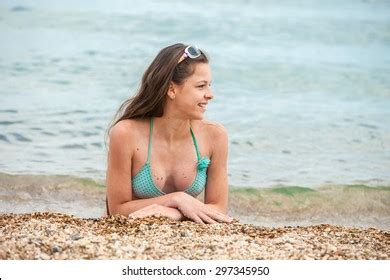 Brunette Tourist Lying Beach Sand Tanning Stock Photo