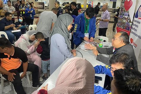 3rd batch of filipinos from gaza arrives in ph abs cbn news