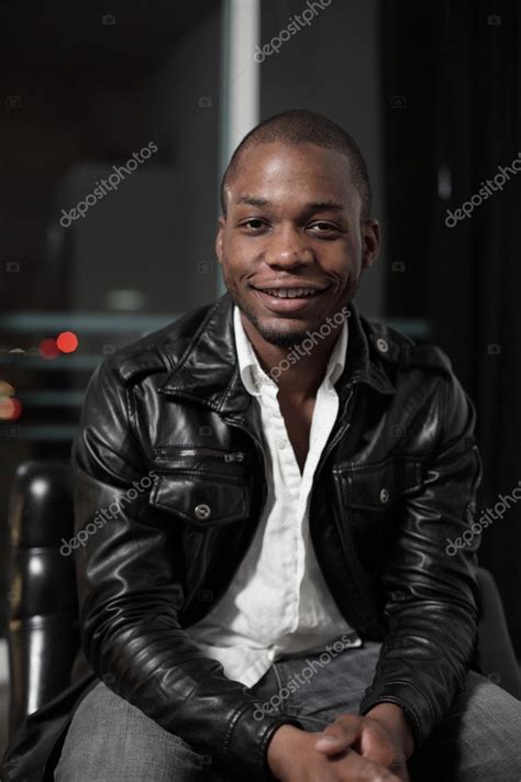 Handsome Young Black Man Smiling Stock Photo By ©felixtm 2596039