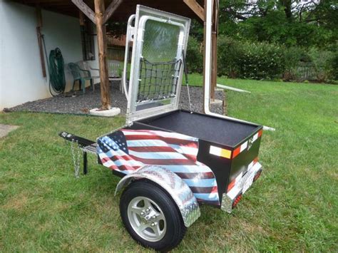 Motorcycle carrying trailers may be open or enclosed. 2011 Pull behind motorcycle trailer - Harley Davidson Forums