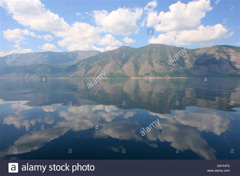 Lake Baikal And Mountains Of Siberia With Beautiful Sky And Clouds