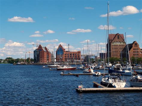 This article deals with the port of rostock; Warehouses at the city harbour of Rostock, Germany