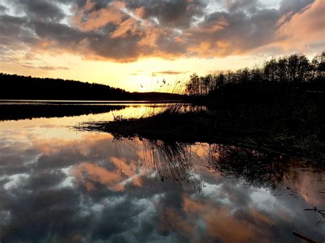 Amazing Sunset Water Mirror Reflection In Sweden Mariefred Rbackpacking