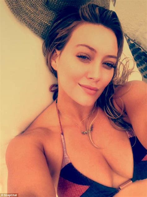 Hilary Duff Flashes Her Cleavage On A Tropical Getaway With Her Beau Jason Walsh Daily Mail Online