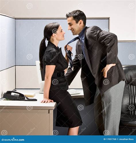 Co Workers Kissing In Office Cubicle Stock Photo Image Of Couple