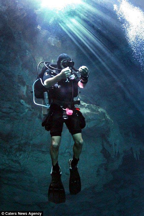 Scuba Diver Pictures Ancient Mayan Sinkhole Deep In The Mexican Jungle