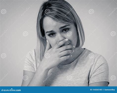Portrait Of Sad And Intimidated Woman Isolated In White Background