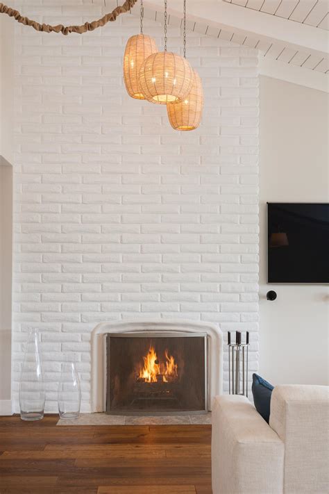 Painters tape + towels to cover the floor. 15 Gorgeous Painted Brick Fireplaces | HGTV's Decorating ...