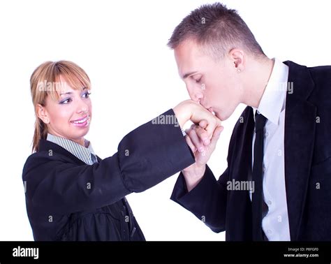 Handsome Businessman Kisses Ladys Hand Studio Shot Stock Photo Alamy
