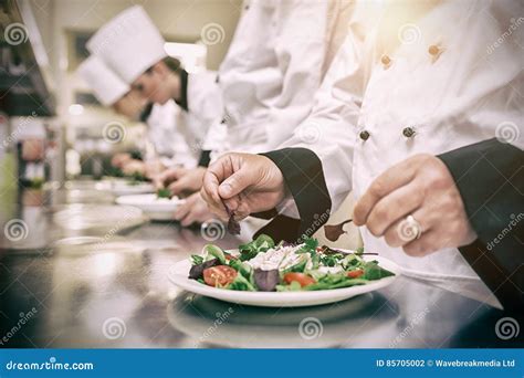 Chef Garnishing Salads Stock Photo Image Of Dish Female 85705002