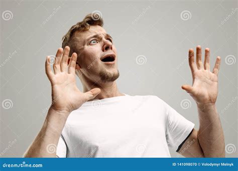 Portrait Of The Scared Man On Gray Stock Photo Image Of Facial