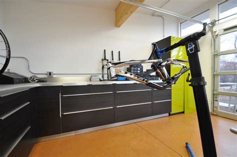 A classic aesthetic meets modern materials and efficient design. Bike Workshop interior - Modern - Garage And Shed - denver ...