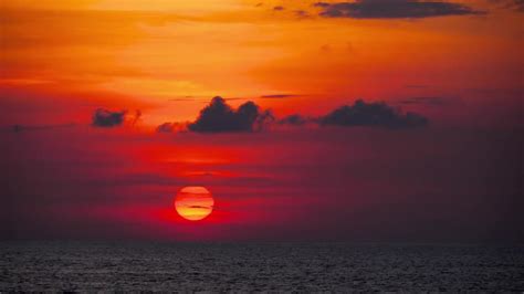Red Sunset Over Ocean Stock Video Motion Array