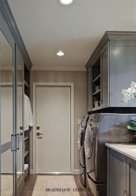 The marble checkerboard floor and black cabinets make this laundry room unusually elegant. Gray Laundry Room - Transitional - laundry room - Bradshaw ...