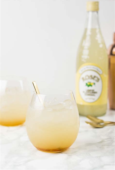 lemon and honey gin and tonic made with roses lemon cordial an easy drink that is perfect for