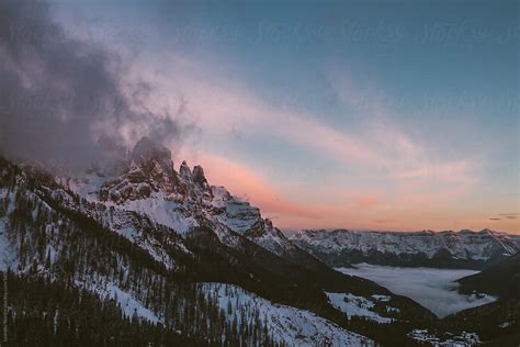 Panorama View Of Snowcovered Italian Alps At Sunset By Stocksy