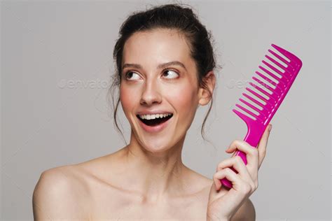 Excited Half Naked Woman Posing With Comb On Camera Stock Photo By