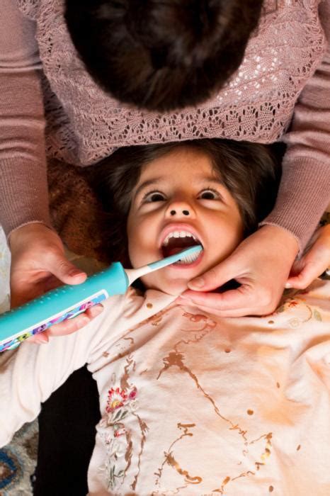 The Easy Way To Brush Baby And Toddler Teeth Without A Struggle