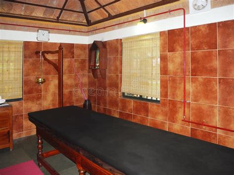 Ayurvedic Massage Table And Shirodhara Device In Treatment Room Kochi Kerala India Stock