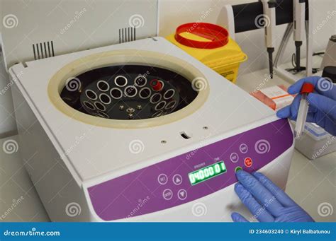 Scientist Putting Test Tube Into Centrifuge Stock Photo Image Of Tube