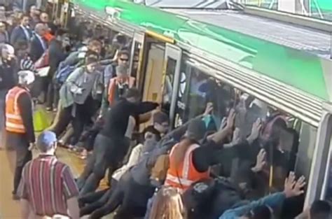 Commuters Work Together To Free A Trapped Man From A Train In Perth
